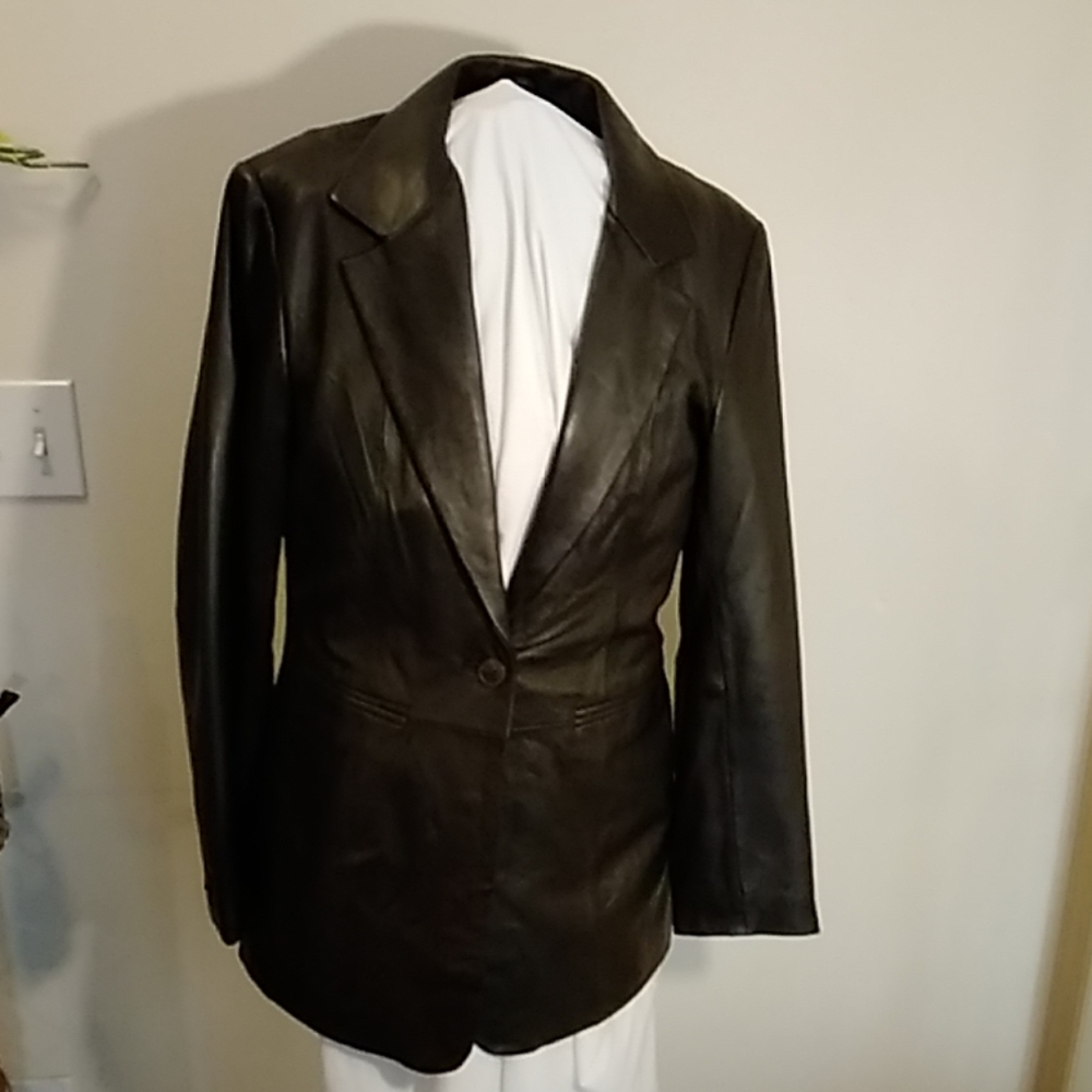 Black leather coat lightly used in excellent condi